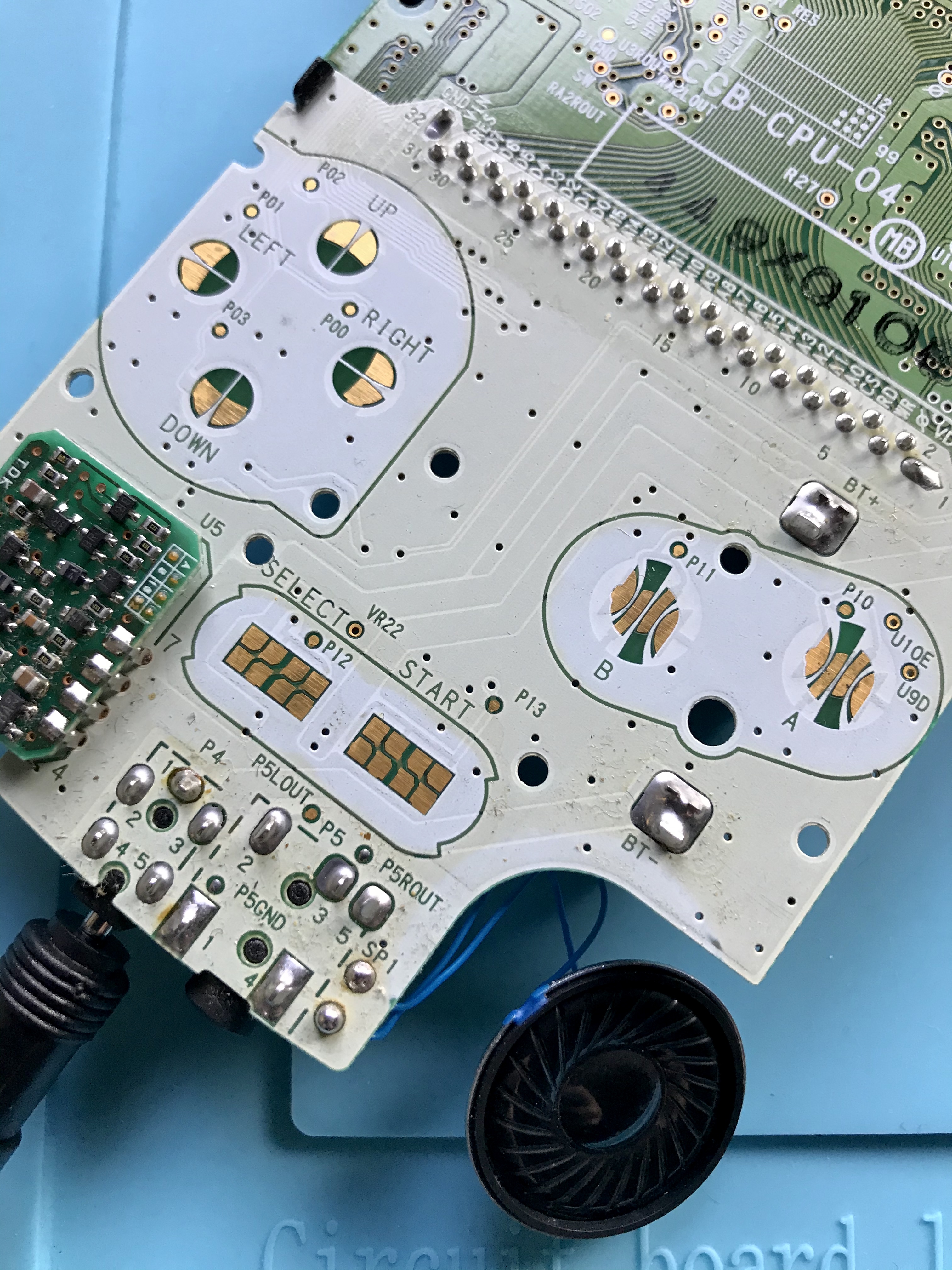 Aftermarket loudspeaker installed on Game Boy Color board