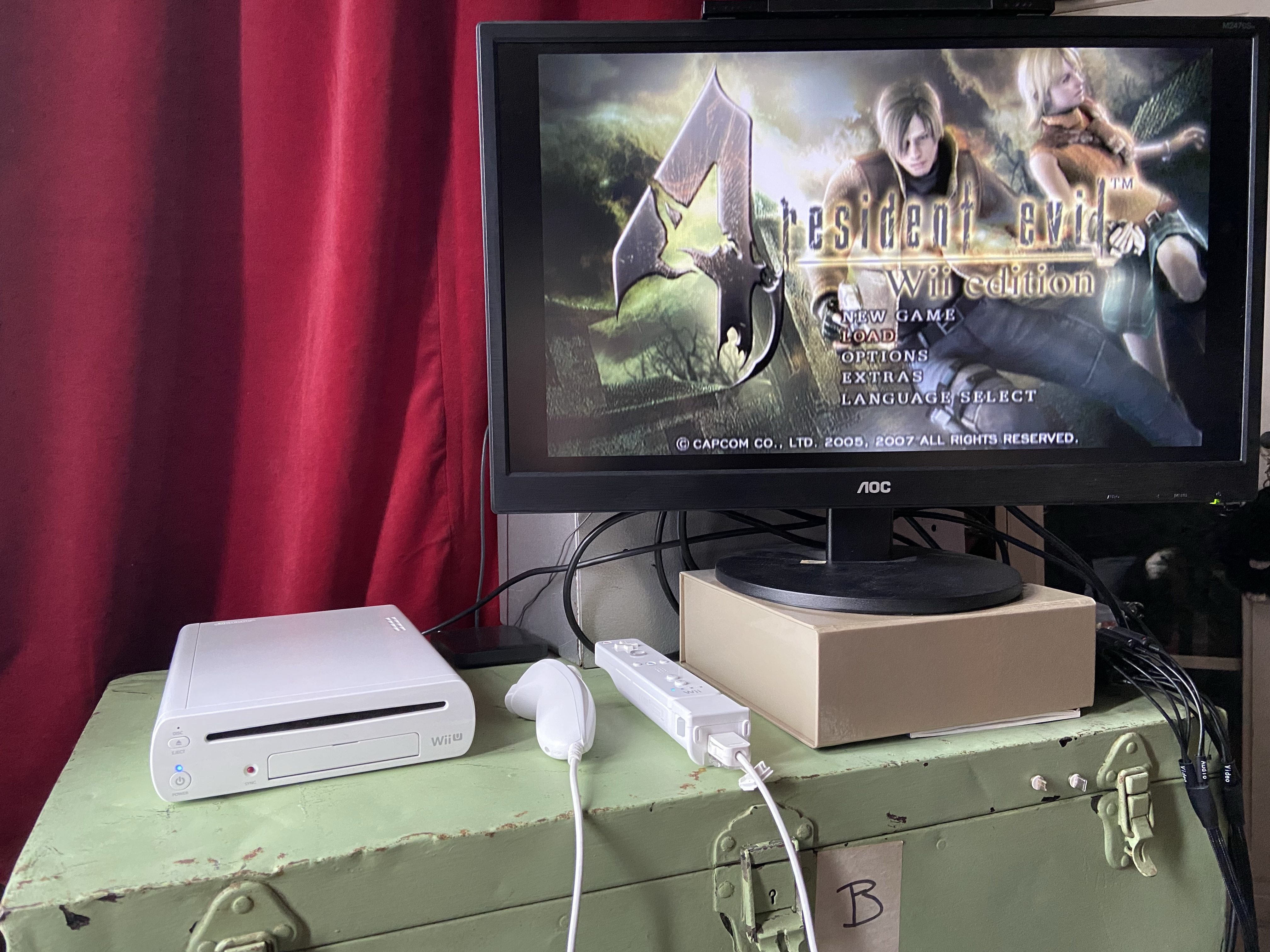 Wii U playing Resident Evil 4 for the Wii