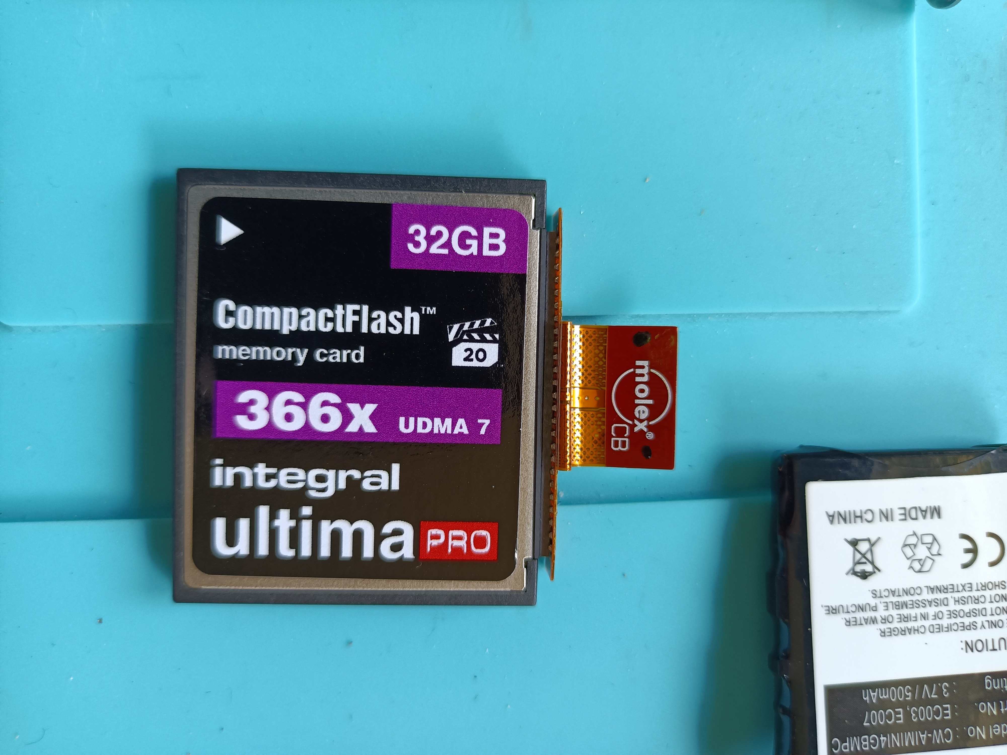 iPod Mini drive connector connected to 32GB CF card