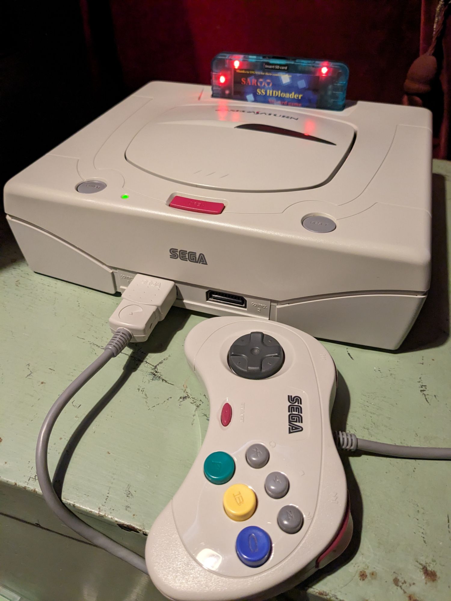 Japanese SEGA Saturn with Saroo cartridge